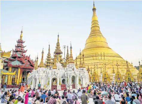  ?? AFP ?? Devotees pray at Shwedagon Pagoda in Yangon, Myanmar, in this Jan 19, 2020 file photo.