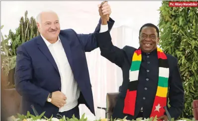  ?? ?? Pic: Hilary Maradzika
Belarusian President Alexander Lukashenko (left) and his Zimbabwean counterpar­t Emmerson Mnangagwa posing for a photo after the two signed eight bilateral agreements at State House in Harare yesterday