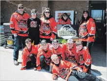  ?? KRIS DUBE ?? Players and parents from the Wainfleet Wild raised nearly $2,500 for the Humboldt, Sask., community on Saturday by selling hotdogs and hamburgers at Sobeys in Port Colborne.