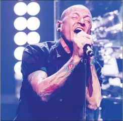  ?? The Associated Press ?? Chester Bennington of Linkin Park performs during the iHeartRadi­o Live Series in Burbank, Calif., in 2014.
