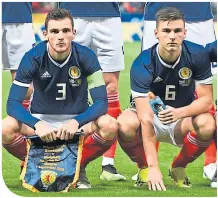  ??  ?? Andy Robertson and Kieran Tierney have yet to flourish playing together for Scotland