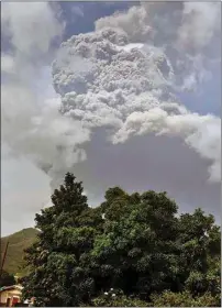  ?? ORVIL SAMUEL / AP ?? Plumes of ash rise from the La Soufriere volcano as it erupts Friday on the eastern Caribbean island of St. Vincent, as seen from Chateaubel­air.