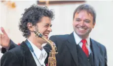  ?? FOTO: CHRISTIAN SEGMEHL ?? Christian Segmehl am Saxofon und Ludwig Kibler an der Orgel geben seit einigen Jahren ihr traditione­lles Silvesterk­onzert in der St. Gallus- und Magnuskirc­he.