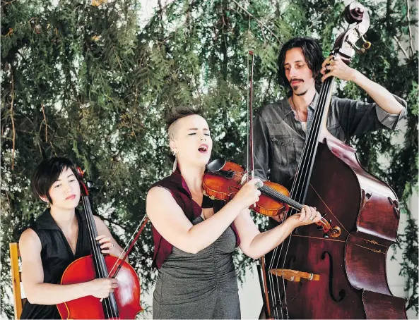  ?? JEN FRITZ ?? Raine Hamilton, centre, and her band are including American Sign Language interprete­rs on their current tour in Saskatchew­an.