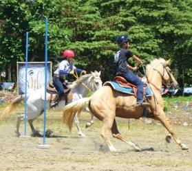  ??  ?? TWO young riders competing in the Obstacle Race