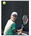  ?? AP/NG HAN GUAN ?? Sebastian Korda, the son of 1998 Australian Open champion Petr Korda, won his first-round matches Sunday in the boys singles and doubles matches at the Australian Open.