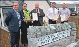  ??  ?? From left: Police Scotland national designing out crime manager Stuart Ward; Skye’s Inspector Lynda Allan; Lochalsh and Skye Housing Associatio­n chief executive Lachie MacDonald; Lewis Ross, site agent O’Brien Properties; and Greig Ross, architect,...