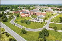  ?? CHUCK HAMLIN / STAFF ?? An aerial view of the campus of Central State University on Brush Row Road in Wilberforc­e. The historical­ly black university and the city of Xenia announced plans Thursday to annex the 600-acre, 36-building campus into the city’s limits.