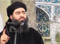  ?? THE ASSOCIATED PRESS ?? This image from video posted on a militant website purportedl­y shows Islamic State leader Abu Bakr al-Baghdadi delivering a sermon in Iraq. IS released a new message Saturday.