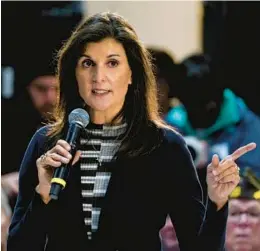  ?? CHARLIE NEIBERGALL/AP ?? Republican presidenti­al candidate Nikki Haley speaks to voters at a town hall campaign event Monday in Urbandale, Iowa.