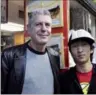  ?? PROVIDED TO CHINA DAILY ?? Anthony Bourdain and Jason Wang, the son of the founder of Xi'an Famous Foods, in a photo posted by Wang to the New York restaurant’s Twitter page last Friday.