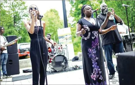  ?? ERIC BARADAT/AFP ?? Members of the go-go music band Body of Evidence perform at the Marvin Gaye Park in Washington.