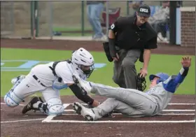  ?? ?? (right) slides by the tag of Fort Smith Southside catcher Luke Jackson Monday during the third inning of the Mounties’ 9-0 victory at Forsgren Field in Fort Smith. Marcotte singled with two outs and was later brought home by Ty Franks to give Rogers a 3-0 lead in the third inning. (NWA Democrat-Gazette/Hank Layton)