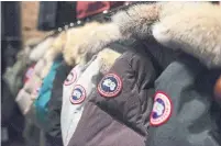  ?? AARON VINCENT ELKAIM/THE CANADIAN PRESS FILE PHOTO ?? Canada Goose plans to open a Beijing flagship and a shop in Hong Kong this fall. It will also expand onto Alibaba’s Tmall.