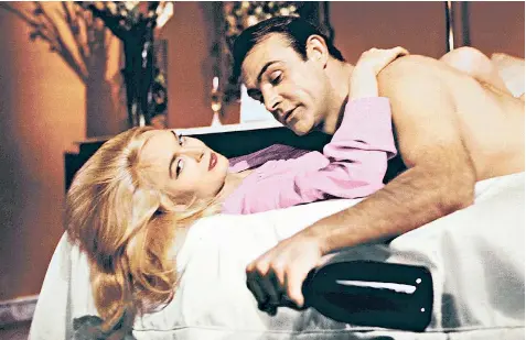  ??  ?? Sir Sean Connery with Shirley Eaton in Goldfinger, 1964. In the latest novel, author Anthony Horowitz says he has preserved Bond’s core values, but has included modern ‘twists’