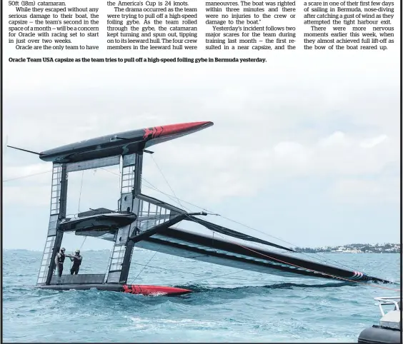  ??  ?? Oracle Team USA capsize as the team tries to pull off a high-speed foiling gybe in Bermuda yesterday.