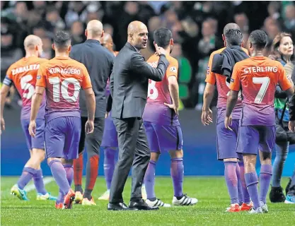  ??  ?? Manchester City manager Pep Guardiola, centre, and his players after their match against Celtic.