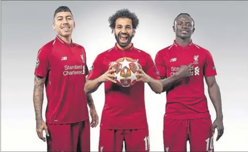  ??  ?? Firmino, Salah y Mané, delanteros del Liverpool.