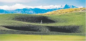  ?? Provided by Buffalo Run ?? Hole No. 14 at Buffalo Run in Commerce City features picturesqu­e views of the Rocky Mountains.