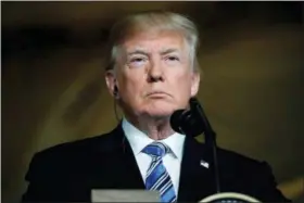  ?? PABLO MARTINEZ MONSIVAIS — THE ASSOCIATED PRESS ?? In this photo, President Donald Trump listens during a news conference with Japanese Prime Minister Shinzo Abe at Trump’s private Mar-a-Lago club, in Palm Beach, Fla.