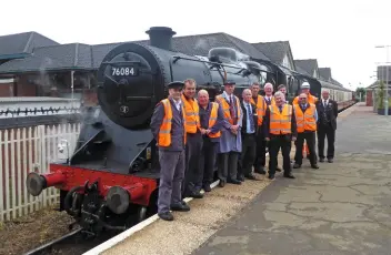  ?? PHILIP BENHAM ?? Cromer crew: ‘poppy Line’ volunteers and staff (and network rail pilotman - in hard hat) pose with no. 76084 on the first day of test running under the north yorkshire moors railway’s safety certificat­e. the 11 return trips on June 6/7 represente­d the...