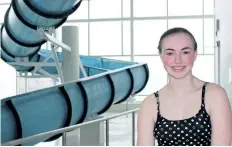  ?? ALISON LANGLEY/ NIAGARA FALLS REVIEW ?? Olivia Bagnulo, 11, made 100 consecutiv­e rides down the water slide at the Niagara Falls YMCA on Saturday in support of the annual Move for Kids campaign.