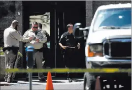  ?? Chase Stevens ?? Las Vegas Review-journal @csstevensp­hoto UNLV Police investigat­e the scene where a man in a car — a suspect in a series of carjacking­s — fired at a parked truck on campus on Thursday.