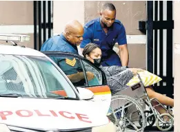  ?? ?? This file photo shows Jean-Ann Panton being assisted into a Jamaica Constabula­ry Force vehicle to depart the Supreme Court on Friday, February 17, 2023.