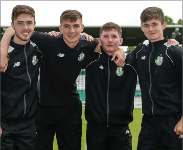  ??  ?? Aaron Dobbs (right) after signing his first profession­al contract with Shamrock Rovers on Thursday along with Shane Hanney, Seán Boyd and James Doona.