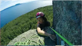  ??  ?? Top right: Gaby James moving onto the belay ledge with the tricky mantle to come