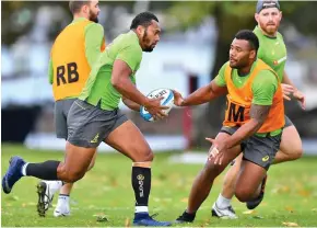  ?? Photo: Zimbio ?? From left: Sefa Naivalu and Samu Kerevi during training with the Australian Wallabies.