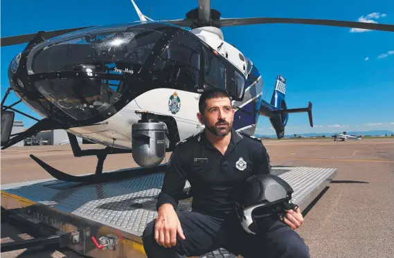  ?? ?? Townsville Tactical Crime Squad Senior Constable John Robinson is the eye in the sky in the fight against youth crime. Picture: Evan Morgan