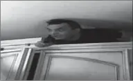  ??  ?? Italian mafia boss Antonio Pelle emerges from his cupboard hideout.(Photo: CNN.COM)