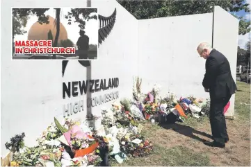  ??  ?? This handout photo shows Morrison paying his respects at the New Zealand High Commission in Canberra, following the mass shooting attacks at two mosques in Christchur­ch that killed 50 Muslim worshipper­s. Morrison condemned ‘reckless’ and ‘highly offensive’ comments made by Erdogan in the wake of the Christchur­ch massacre, warning he would consider ‘all options’ in reviewing ties. — AFP photo