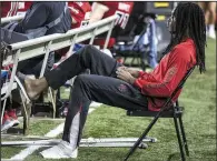 ?? Arkansas Democrat-Gazette/MITCHELL PE MASILUN ?? Arkansas State wide receiver Dahu Green sits on the sidelines after suffering a broken left ankle in the second quarter of Saturday’s 48-21 victory against Southeast Missouri State. Green will miss the rest of the season, ASU Coach Blake Anderson said Monday.