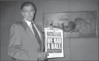  ?? ASSOCIATED PRESS ?? Frank Deford, editor and publisher of The National Sports Daily, holds a proof of the final front page of the newspaper on June 12, 1991.