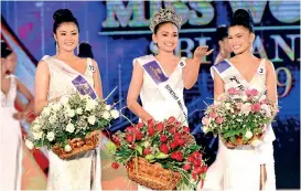  ??  ?? All smiles: Siyatha Miss World Sri Lanka 2019 Dewmini Thathsaran­i flanked by Thulja Yang 1st runner-up (to her right) and Deema Munasinghe 2nd runner-up.