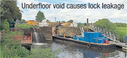  ?? PHOTO: COLIN WAREING, COLIN AND CAROLE’S CREATIONS ?? Workboat Gawburn waits as water is pumped around and from within the lock.