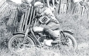  ?? ?? Jeff Smith on the steed with which he is most associated, riding a 500cc BSA at the British 500 MX GP Farleigh Castle in 1966.