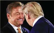  ?? ASSOCIATED PRESS ?? President Donald Trump greets U.S. Sen. Dean Heller at the Nevada GOP Convention at Suncoast Hotel and Casino in Las Vegas on Saturday.