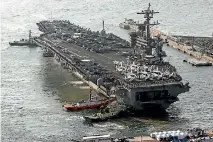  ?? PHOTO: REUTERS ?? The USS Carl Vinson arrives for a joint military exercise with South Korea last week.