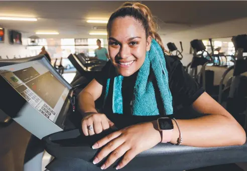  ??  ?? HANDY DEVICE: Your Fitness group trainer Kiara Pitt loves her Fitbit Versa watch. Picture: STEWART McLEAN