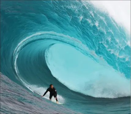  ?? SLATTER ?? THE RIGHT STUFF: Mick Corbett at the Right in Australia, a nomination for the WSL Big Wave Awards.