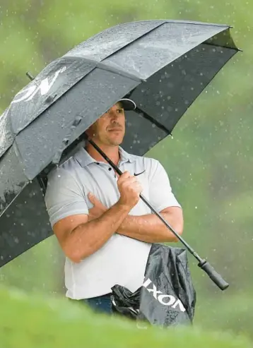  ?? ABBIE PARR/AP ?? Brooks Koepka waits to play on the 16th hole during the third round of the PGA Championsh­ip on Saturday at Oak Hill Country Club in Pittsford, N.Y.