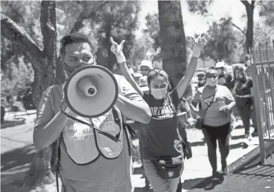  ?? THOMAS HAWTHORNE/THE REPUBLIC ?? Activists, DACA recipients, and others rally Thursday in support of the U.S. Supreme Court ruling on the Deferred Action for Childhood Arrivals program outside of the U.S. Immigratio­n and Customs Enforcemen­t headquarte­rs in Phoenix.