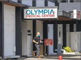  ?? Brian van der Brug Los Angeles Times ?? OLYMPIA MEDICAL CENTER, which opened in 1947, will close Wednesday, despite community pushback and petitions from some L.A. council members.