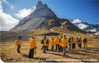  ??  ?? Hiking in Svalbard ©Quark Expedition­s / Acacia Johnson