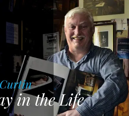  ??  ?? Peter Curtin holding Jack Daulton’s book