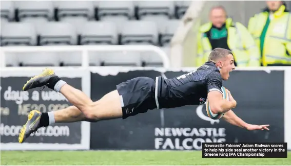  ??  ?? Newcastle Falcons’ Adam Radwan scores to help his side seal another victory in the Greene King IPA Championsh­ip