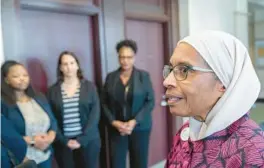  ?? ?? Eatonville resident N.Y. Nathiri addresses members of the media after the hearing between Orange County Public Schools and the SPLC over the future of the 100 acres of land in Eatonville on Thursday in Orlando.